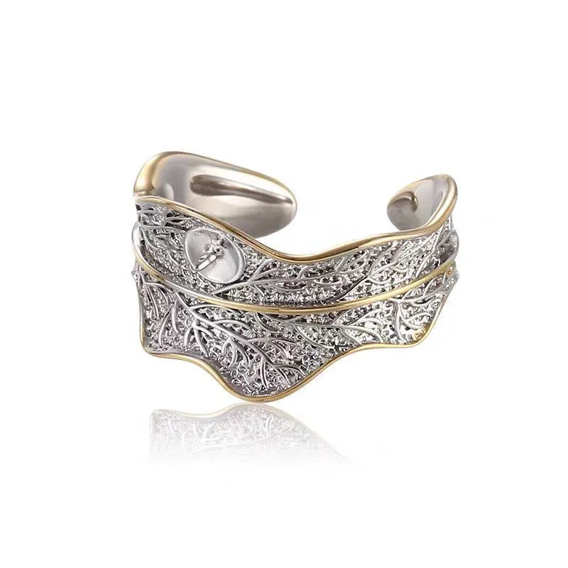 Freshwater pearl ring with irregular leaf design, electroplated metal band, pearl colour, adjustable opening