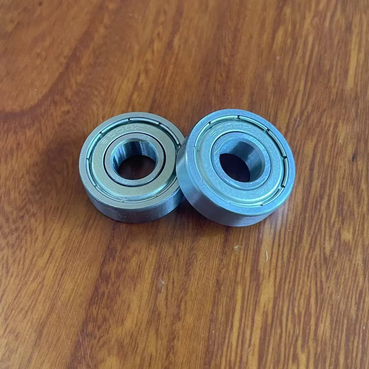 6000ZZ model carbon steel deep groove ball bearing with dimensions 10mm by 26mm by 8mm.