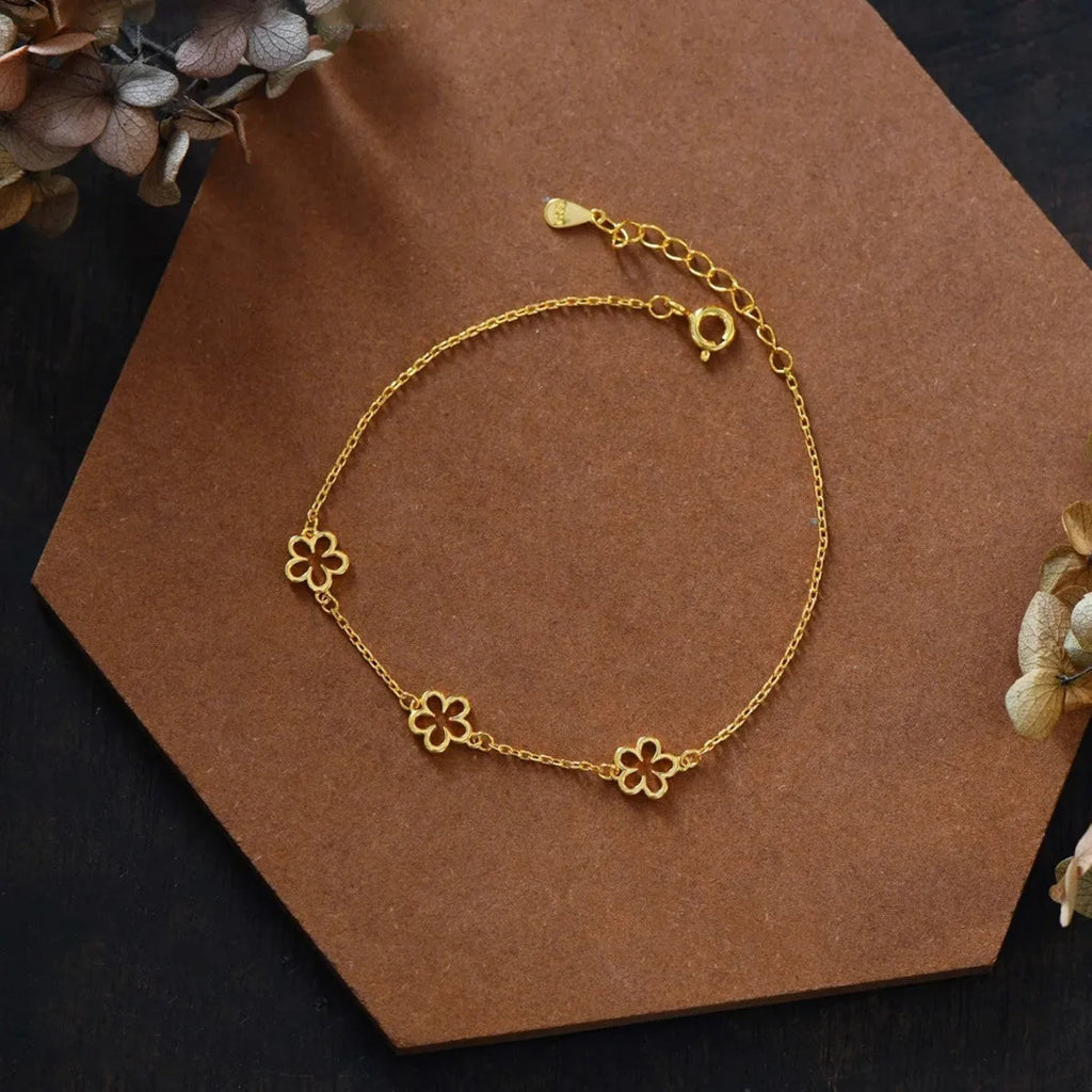 Women's S925 sterling silver bracelet with floral pattern and heart shapes in white gold or golden colour