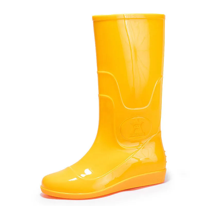 Men's white plastic high tube rain boots with a flat heel on a solid background.
