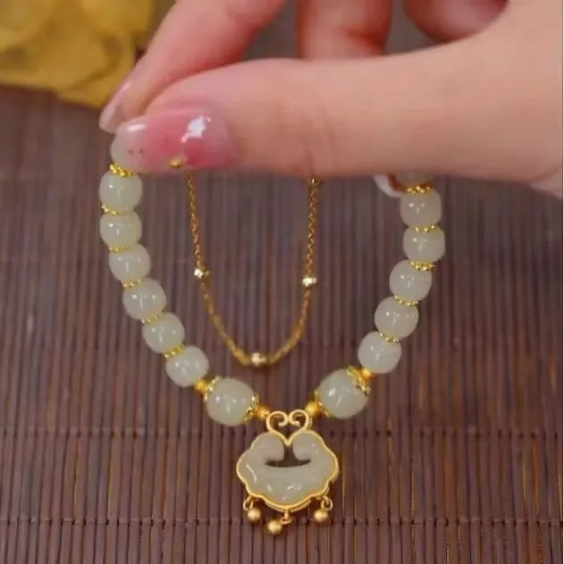 Women's green safety lock bell pendant bracelet with double-layer construction