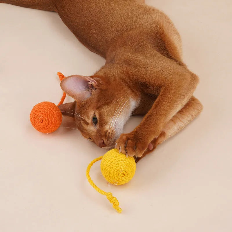 Four-piece cat toy set showing teaser stick and coloured, bite-resistant catnip balls.