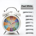White children's alarm clock with LCD pointer and number display, night light button, and cartoon style design
