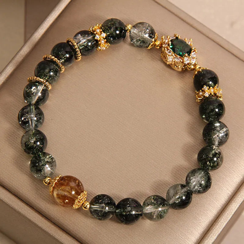 Women's green phantom quartz crystal bracelet with gold rutilated quartz accents and pearl detailing