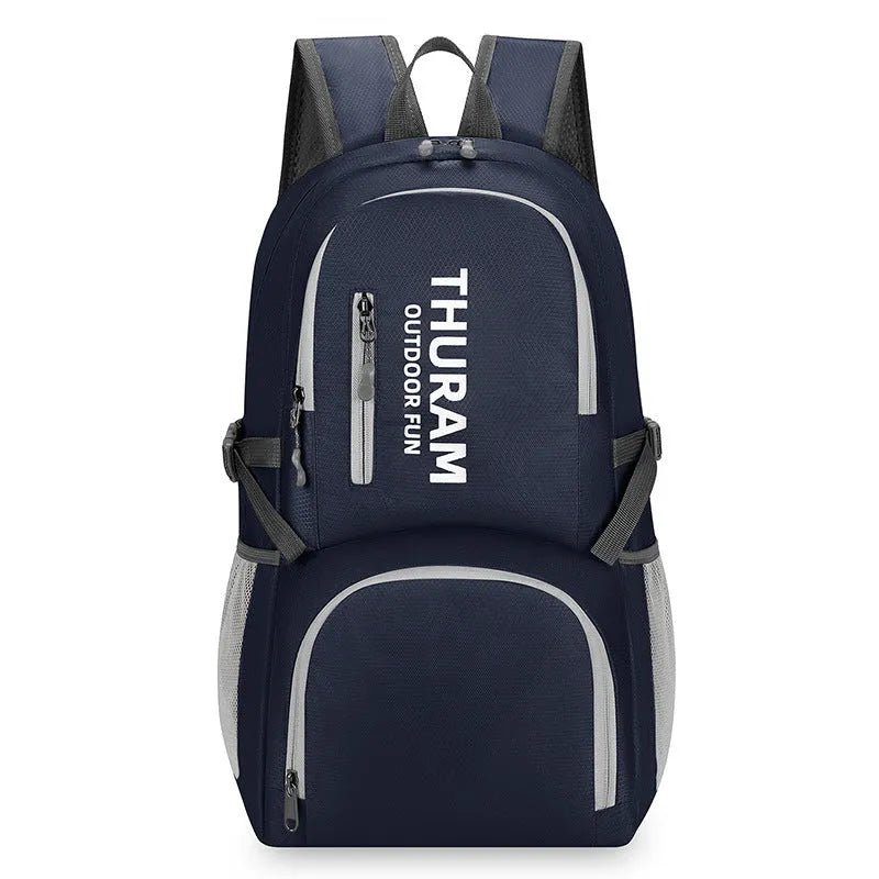 Outdoor backpack in dark blue with air-cushioned shoulder straps and large main compartment