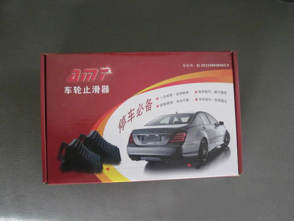 Car tyre skid stop parking locator set showing triangular anti-slip devices in black and silvery colours