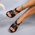 Women's high-heeled sandal with metal buckle, PU upper, rubber sole, black colour option.