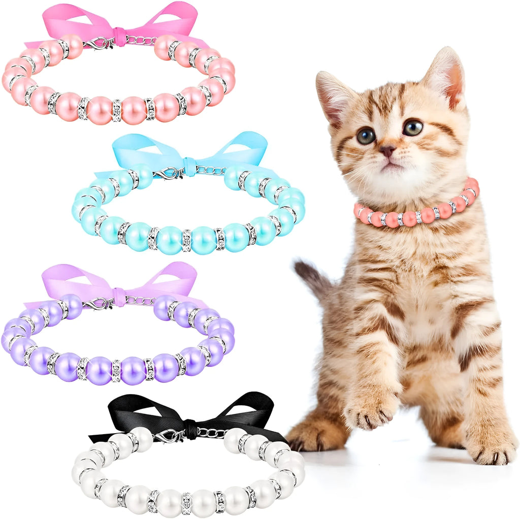 Small dog wearing adjustable pearl and rhinestone necklace with soft ribbon bow in pink colour