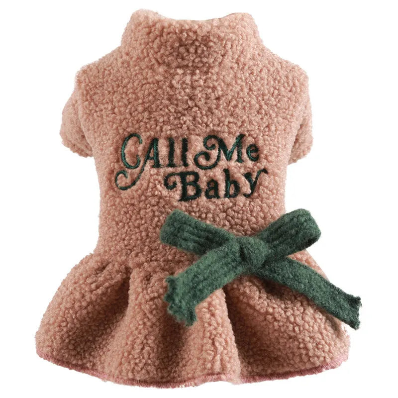 Dog wearing pink fleece skirt with baby letter pattern, Berber fleece pet clothing