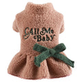 Dog wearing pink fleece skirt with baby letter pattern, Berber fleece pet clothing