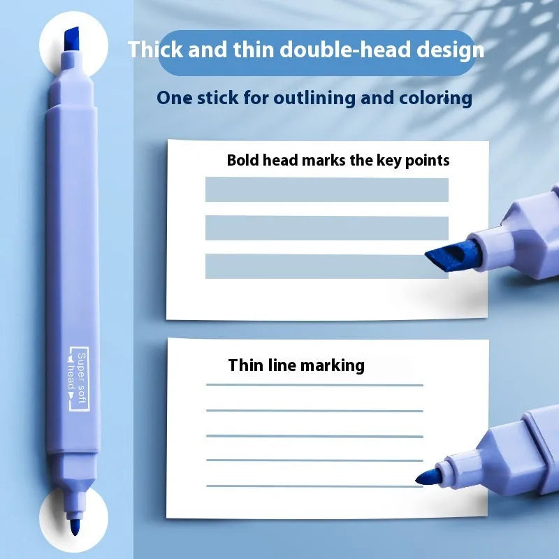 Set of double-ended fluorescent highlighting pens in mixed colours on a white surface.