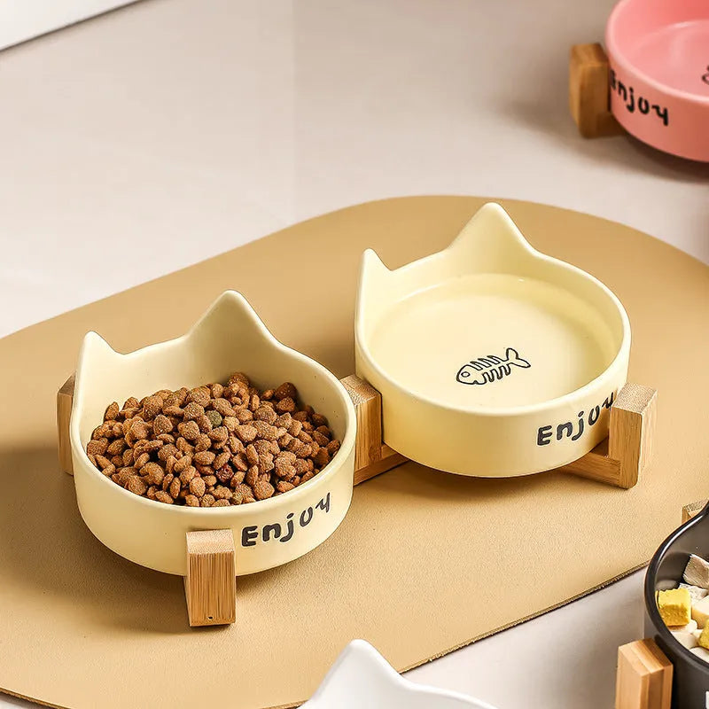 Porcelain cat bowl with cat ears rim and wooden anti-tumble frame in selected colour