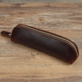 Square handmade cowhide leather pencil case with zipper in black, brown, dark brown, or yellow.