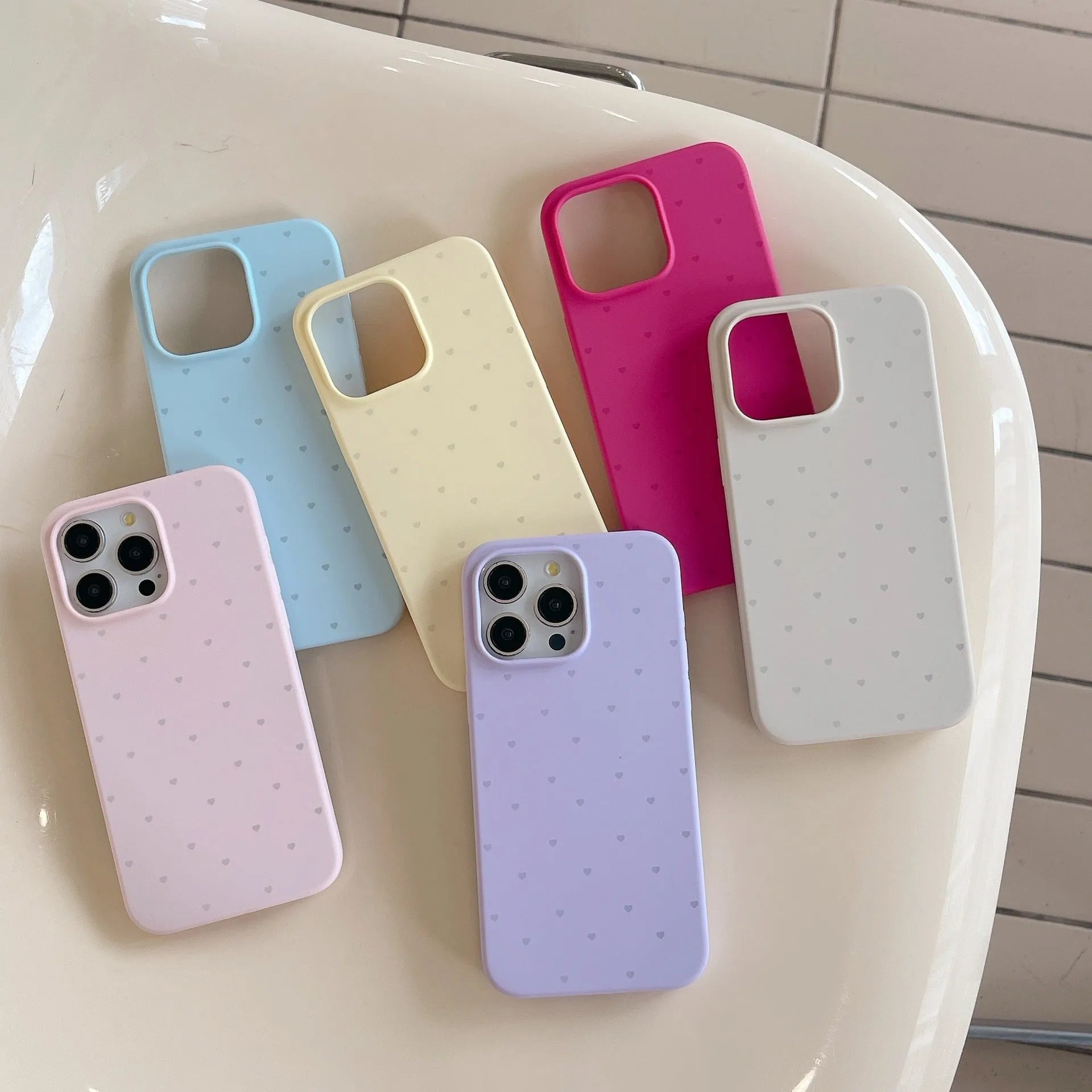 Liquid silicone phone case with love heart design in antique white, fits iPhone 13 Pro Max