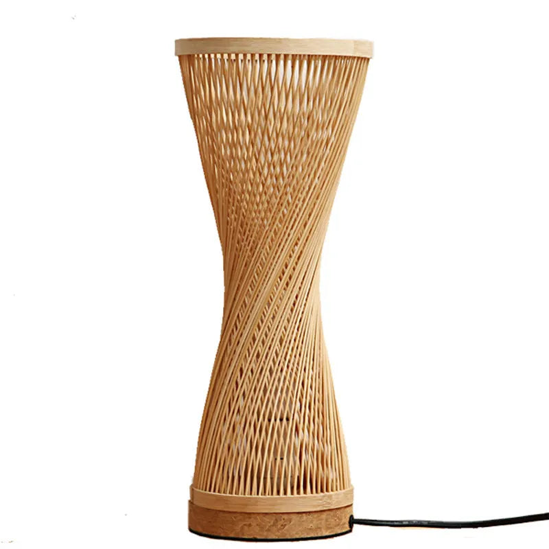 Hand-woven bamboo bedside lamp with natural finish, 40cm height, on wooden bedside table