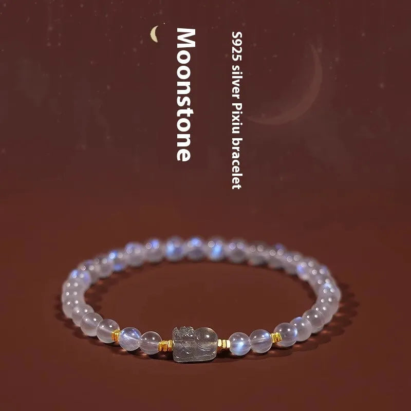 Moonstone women's bracelet with hand-ground beads and animal zodiac charms in fashion blue light colour