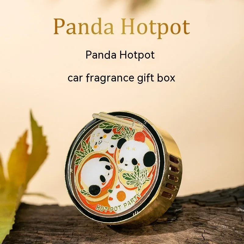 Panda-shaped car air freshener diffuser with changeable fragrance tablets for vehicle odour removal.