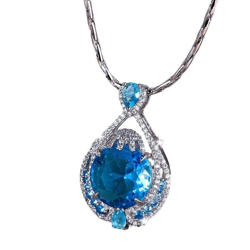 Blue crystal geometric-cut fireworks pendant necklace on water wave chain for women