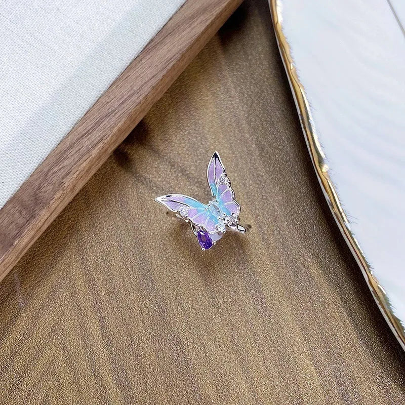 Adjustable copper insect fashion ring with dripped oil antique finish.
