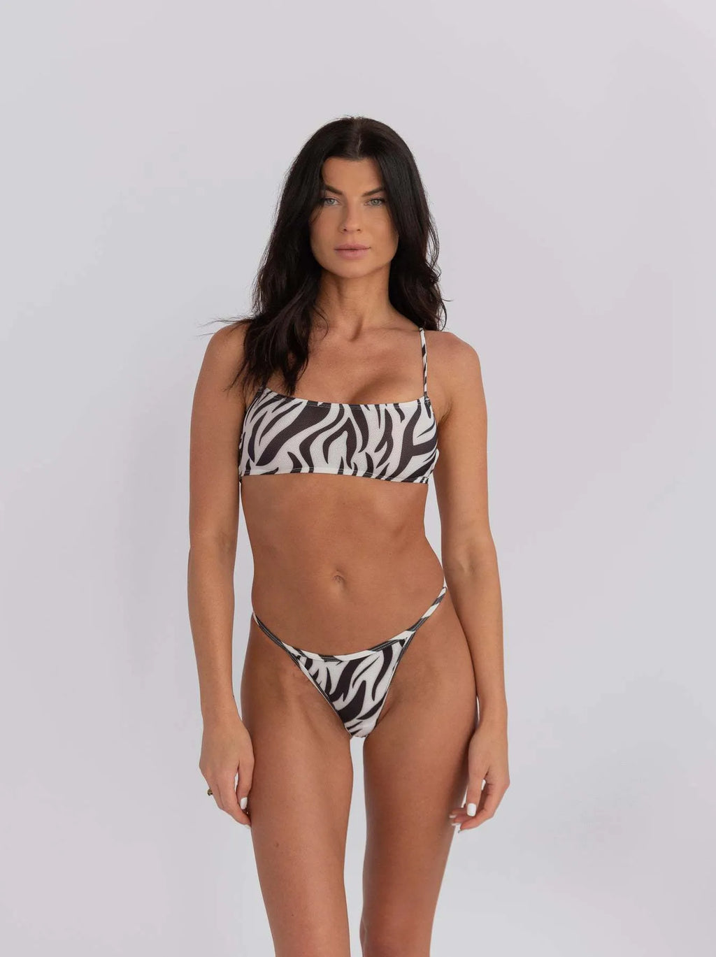Women's striped banded bikini swimsuit in polyester fabric with triangle briefs