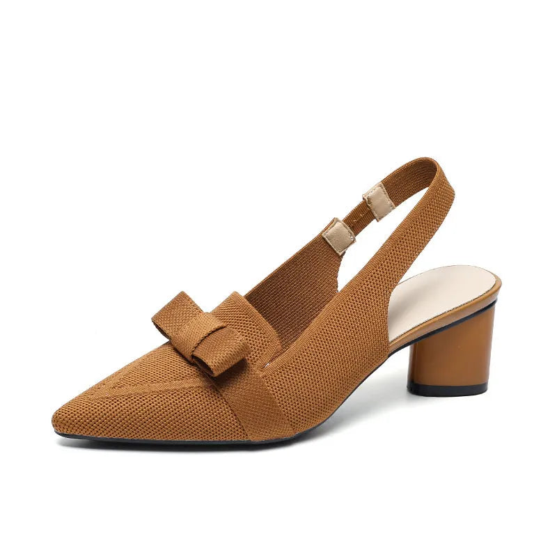 Women's black high heel sandals with closed pointed toe, decorative bow, and ankle buckle strap.