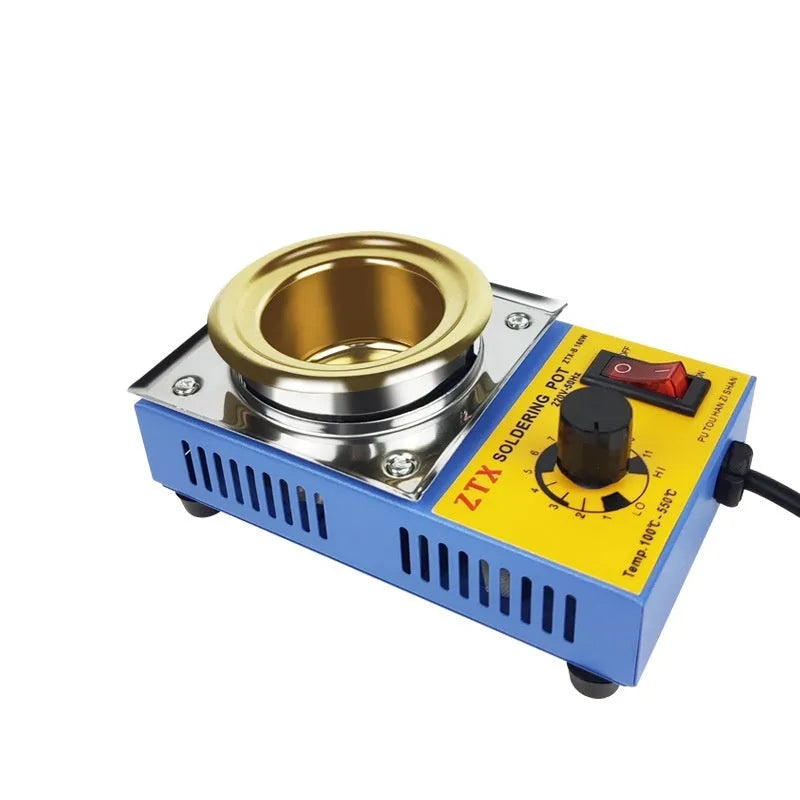 Desktop tin melting furnace with thermostat dial and titanium-plated pot on a workbench.