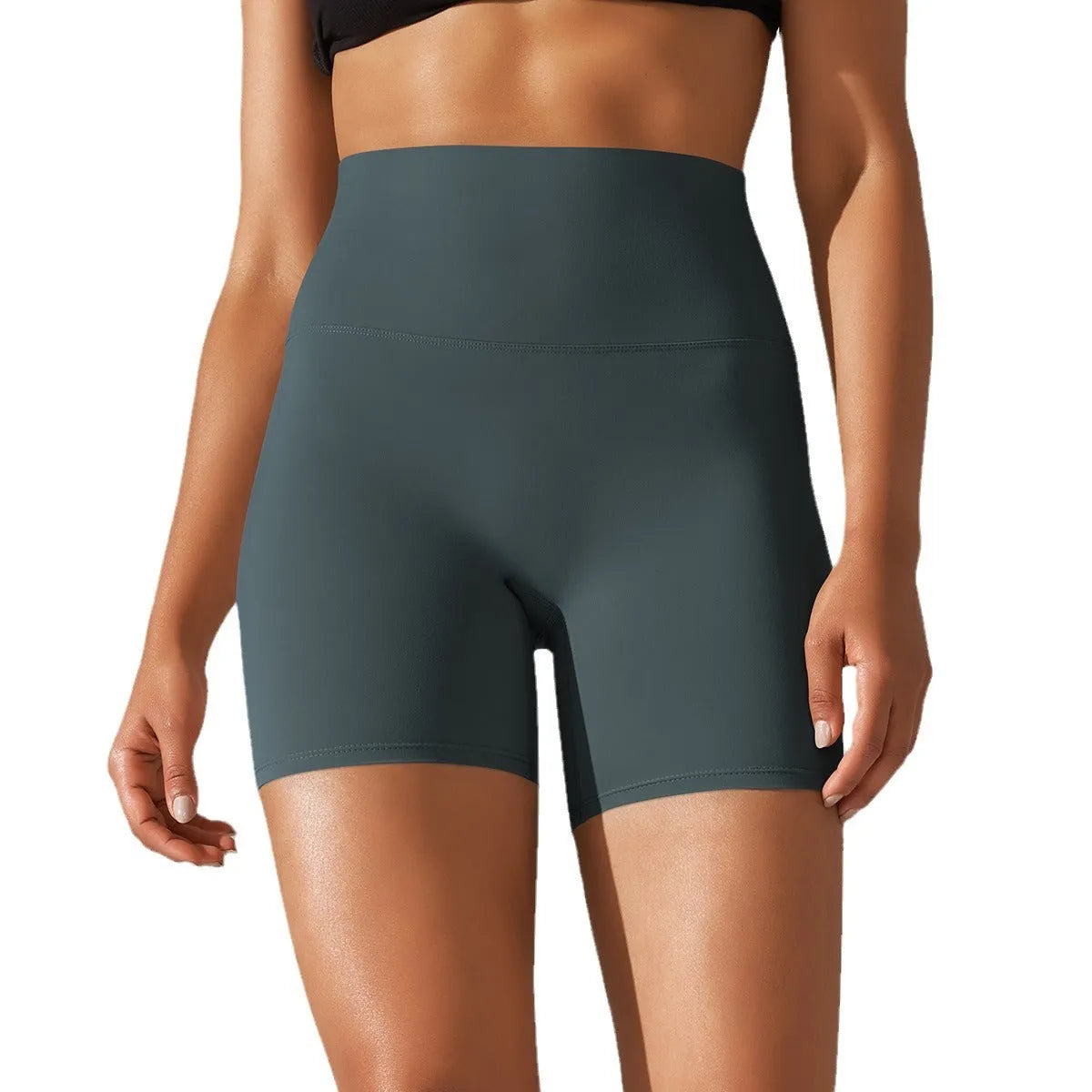Women's high waist fitness tights in dark green for belly control and hip lift during exercise