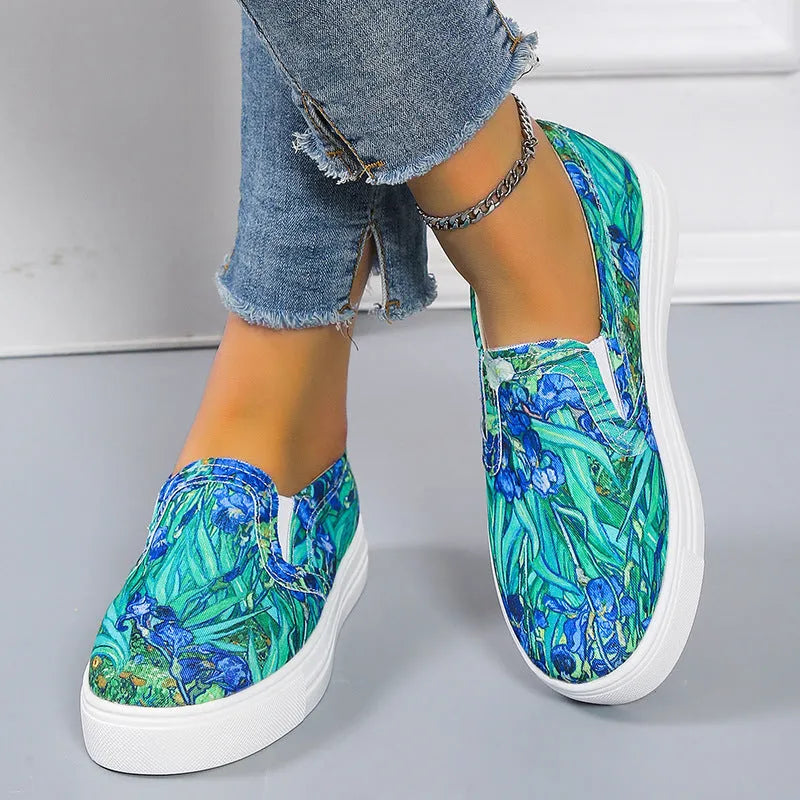 Women's low-top canvas slip-on shoes in colour matching pattern with rubber sole.
