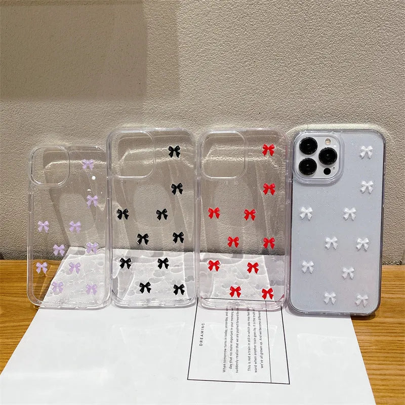 Epoxy glitter bow silicone iPhone case in white, black, purple, or red for iPhone 11 to 16 Pro Max.