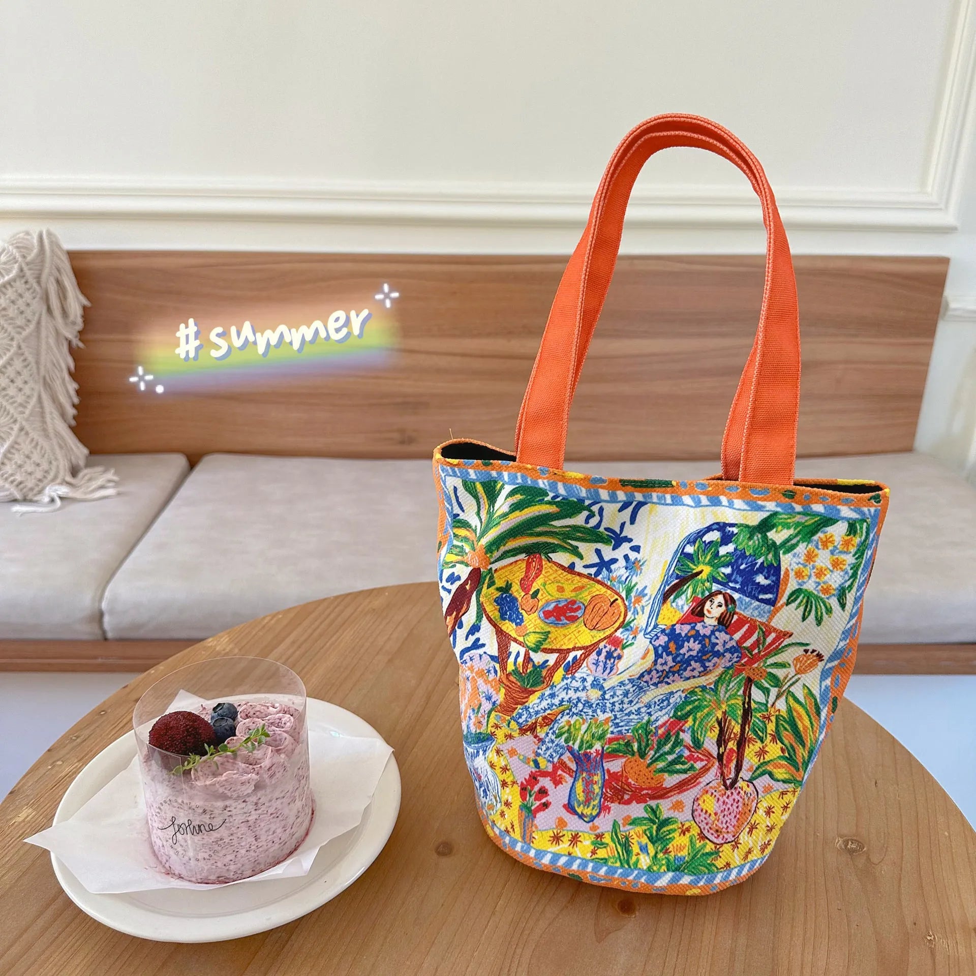 Dream Garden orange plush canvas Thailand artistic bucket bag with double straps and printed details.