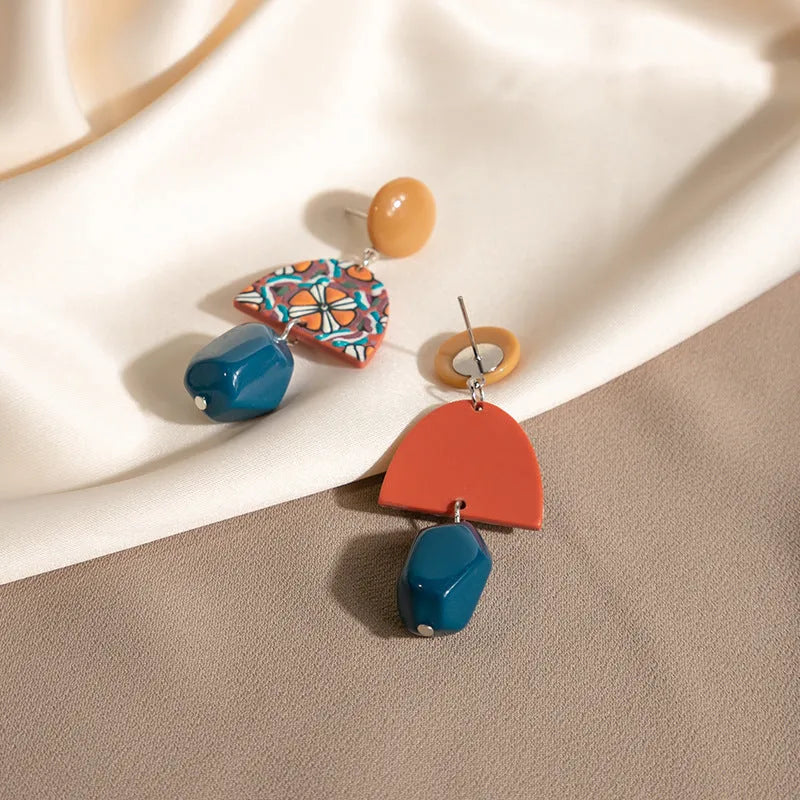Retro yellow and blue acrylic earrings with irregular geometric shape and electroplated finish, one pair