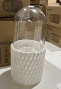 White rotating transparent acrylic makeup brush storage box with lid open showing brush compartments