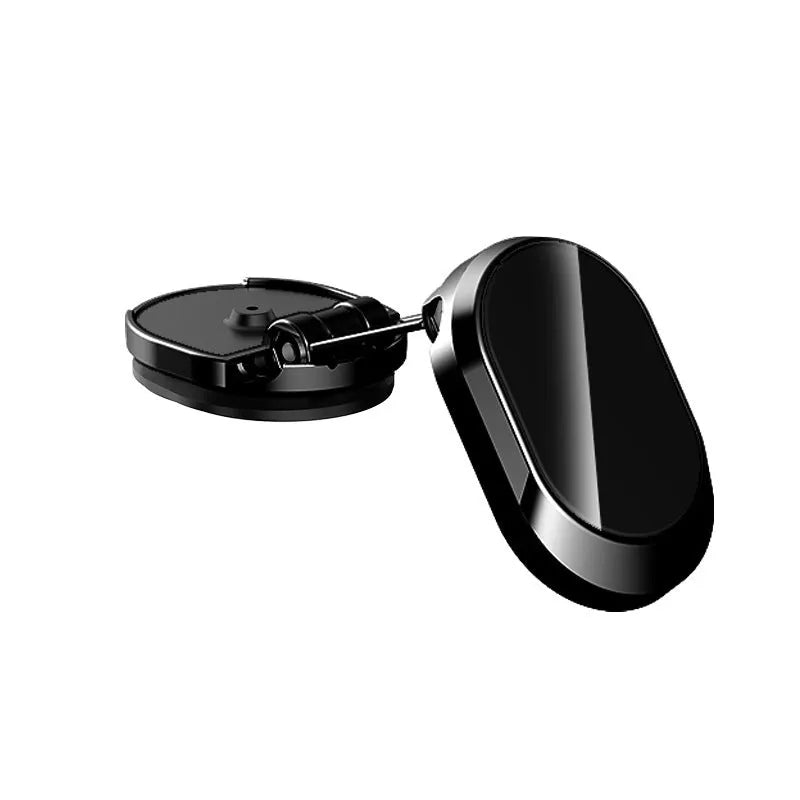 Folding magnetic phone holder in black on car dashboard with phone attached