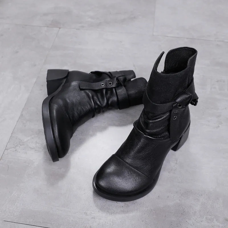 Women's black retro ankle boots with a chunky heel and genuine leather upper.