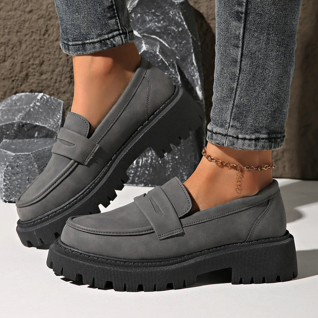 Grey low heel slip-on loafers with metal thick heel and waterproof platform, mid heel 3-5cm, side view