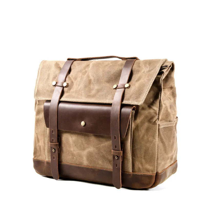 Retro cotton motorcycle messenger bag showing internal phone and document pockets.