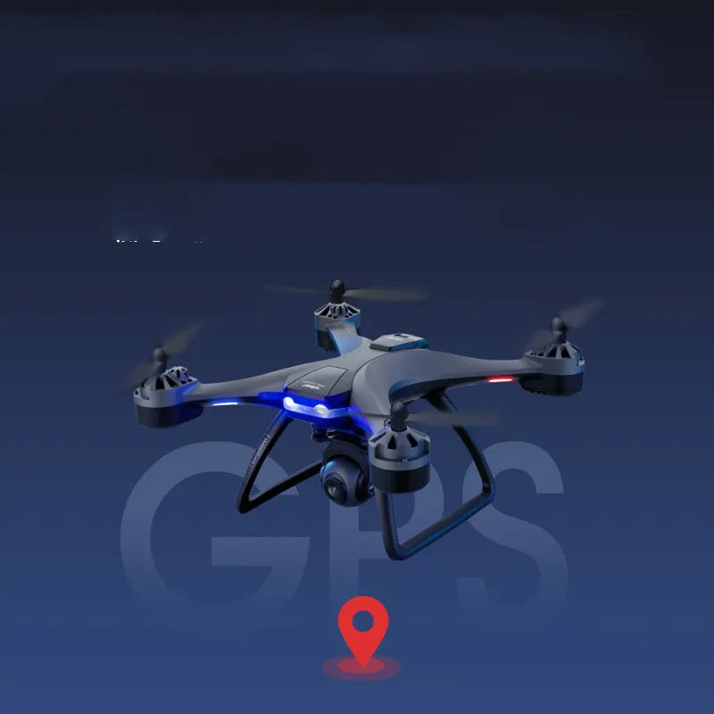 Plastic quadrocopter drone with remote controller, spare blades, and landing gear on a white background.