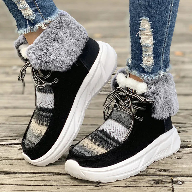 Women's beige lace-up snow boots with fuzzy lining and a thick rubber platform sole