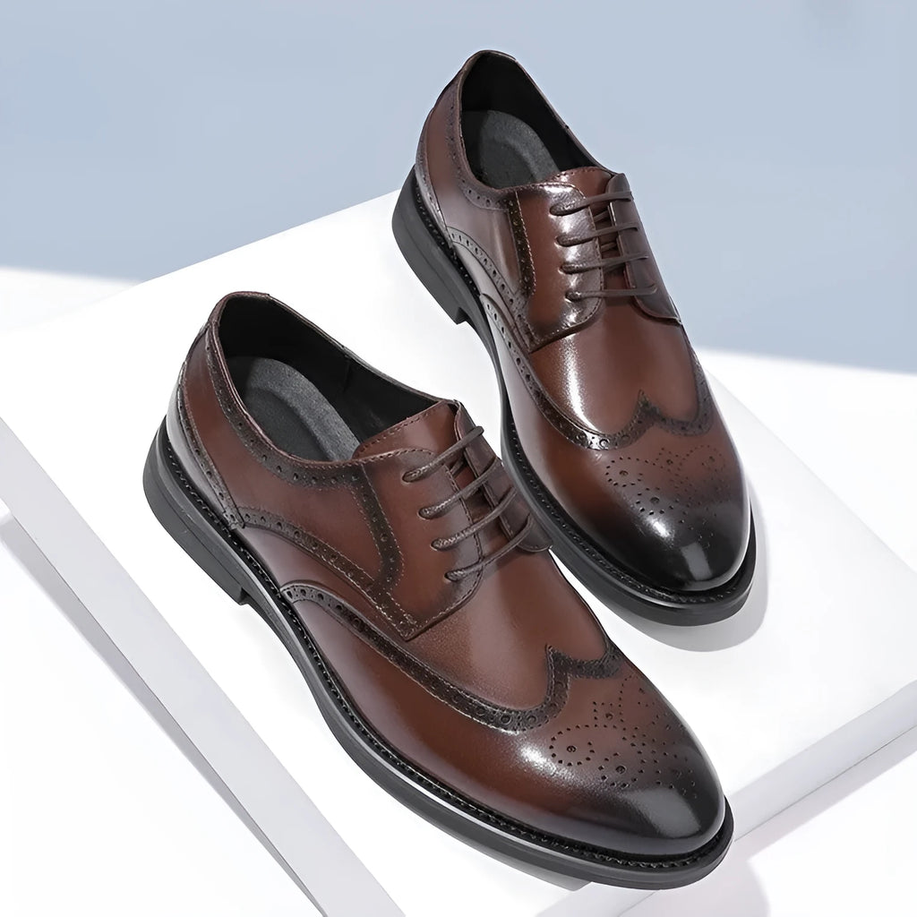 Men's black brogue leather shoes with traditional wingtip design and perforated patterns