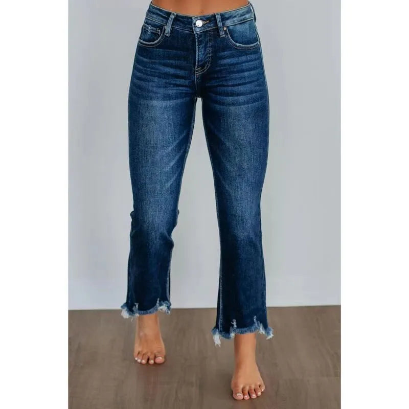 Women's solid colour denim trousers with hand-distressed detailing in dark blue