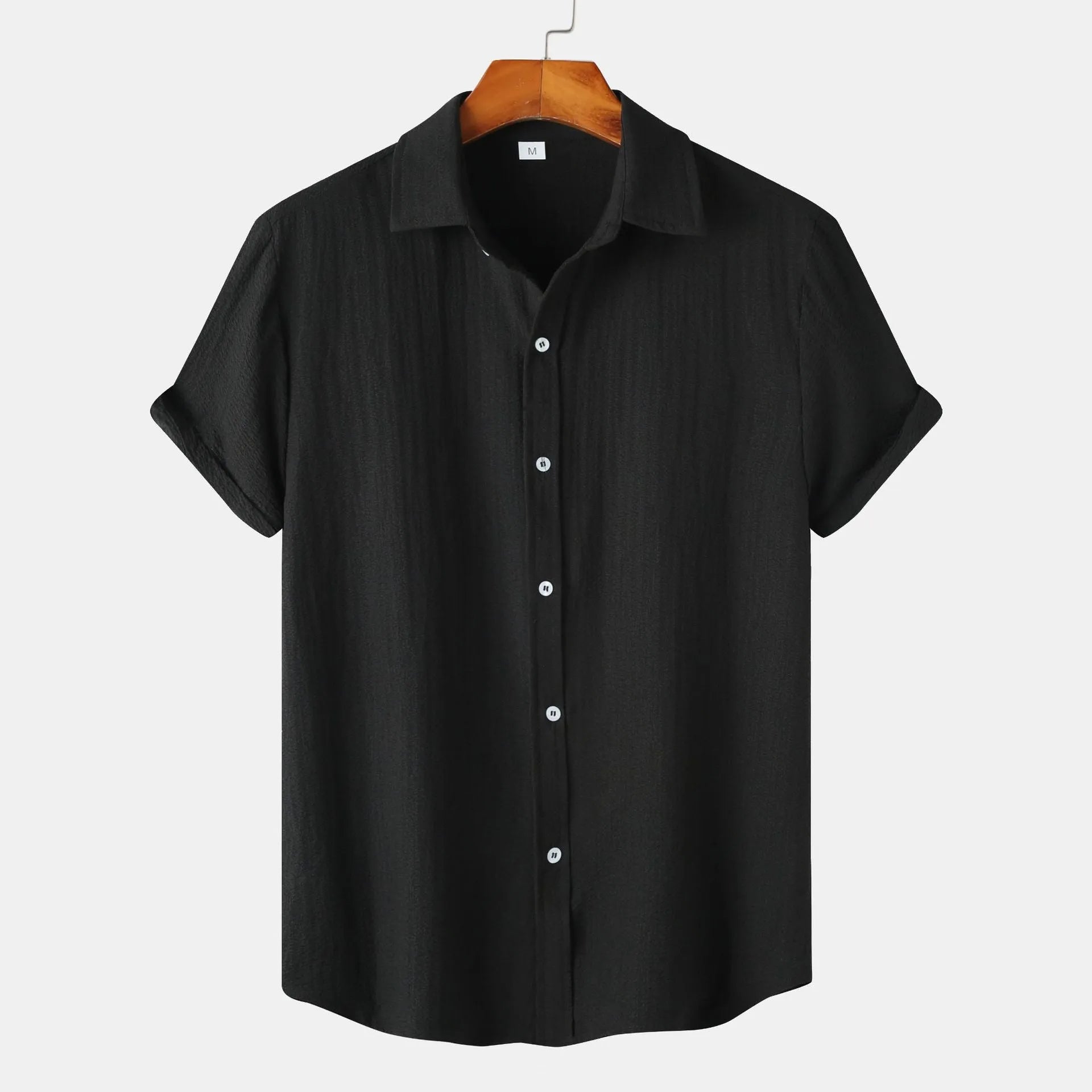 Men's light grey short-sleeve cardigan style casual shirt on a hanger.