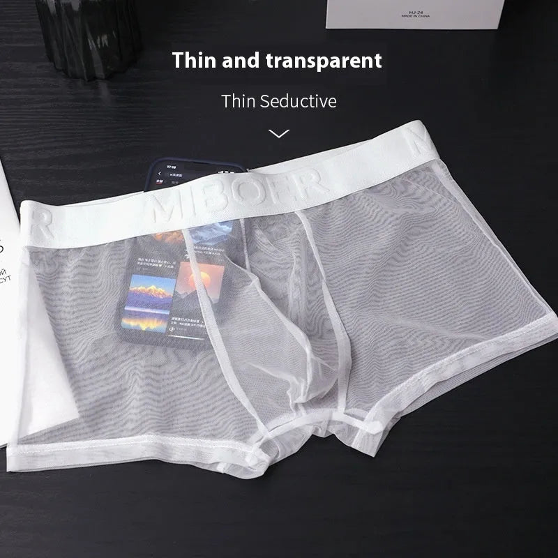 Men's thin quick-dry boxer in solid colours showing size range from M to XXXL.