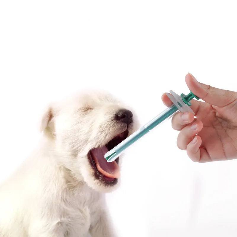 Two silicone pet pill shooters with soft tips for administering tablets to cats and small dogs