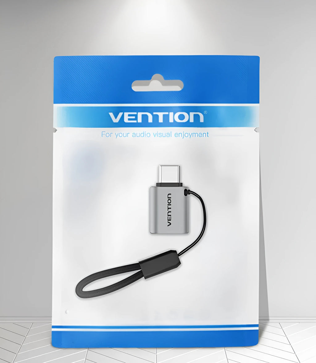 Grey aluminium USB 3.0 C Male to A Female OTG adapter with attached lanyard.
