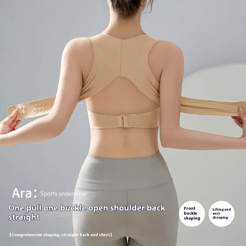 Women's nylon yoga bra with front buckle closure and contoured back.