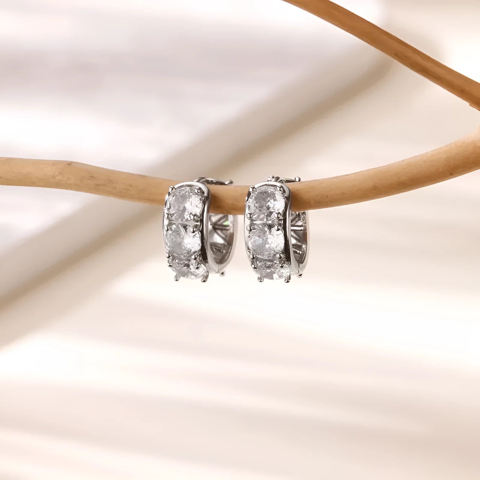 Women's stainless steel U-shaped clip earrings with inlaid zircon stones in colour E5772P.