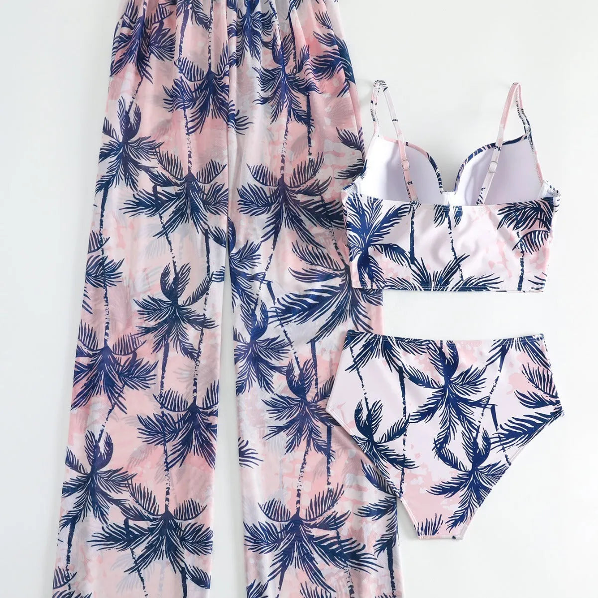 Women's bikini three-piece suit with printed pattern, available in black, blue, and emerald green colours