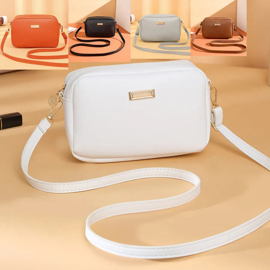 Women's solid colour PU shoulder bag with three-dimensional pocket and horizontal square shape