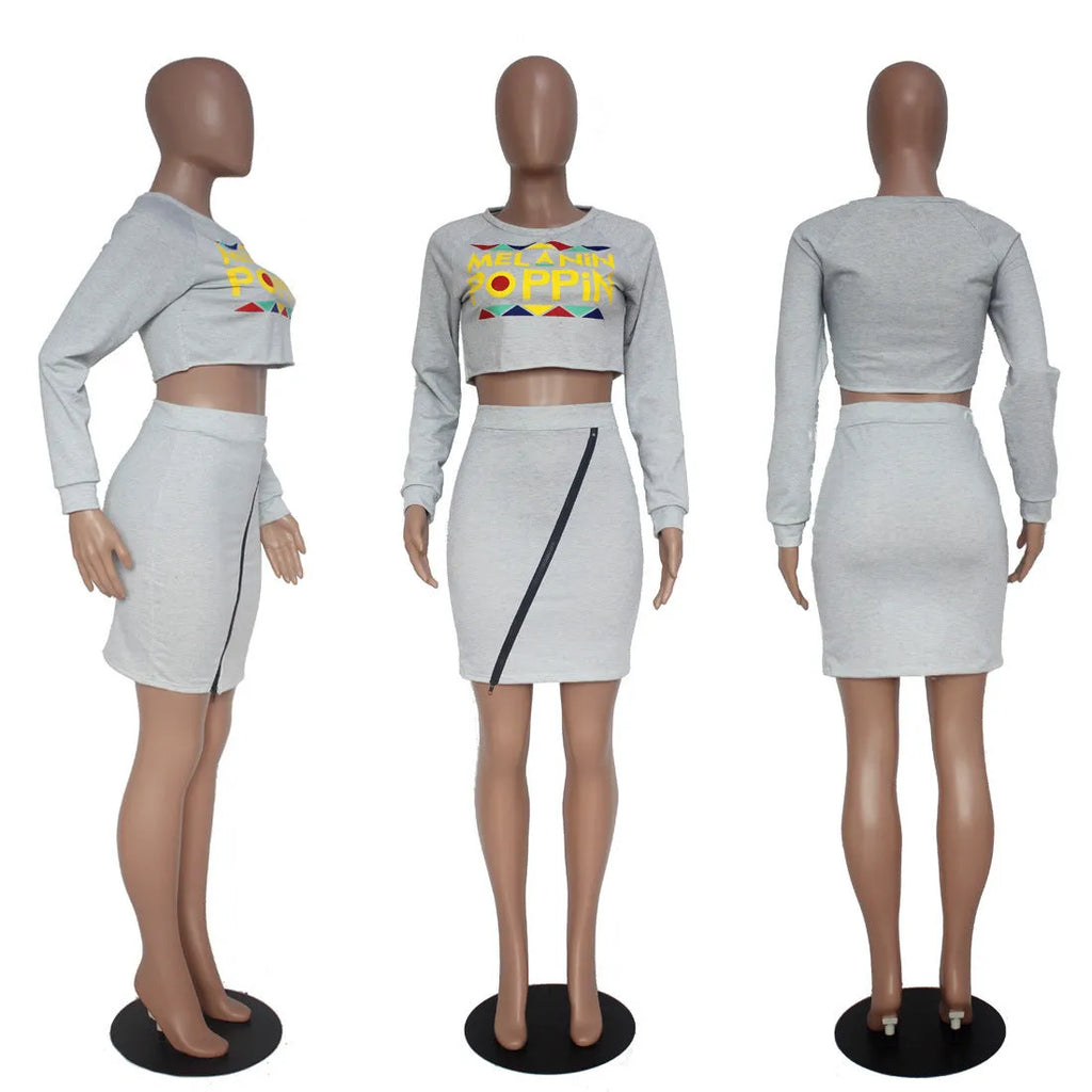 Women's letter print skirt suit with long sleeve top and zipped short skirt in grey or black