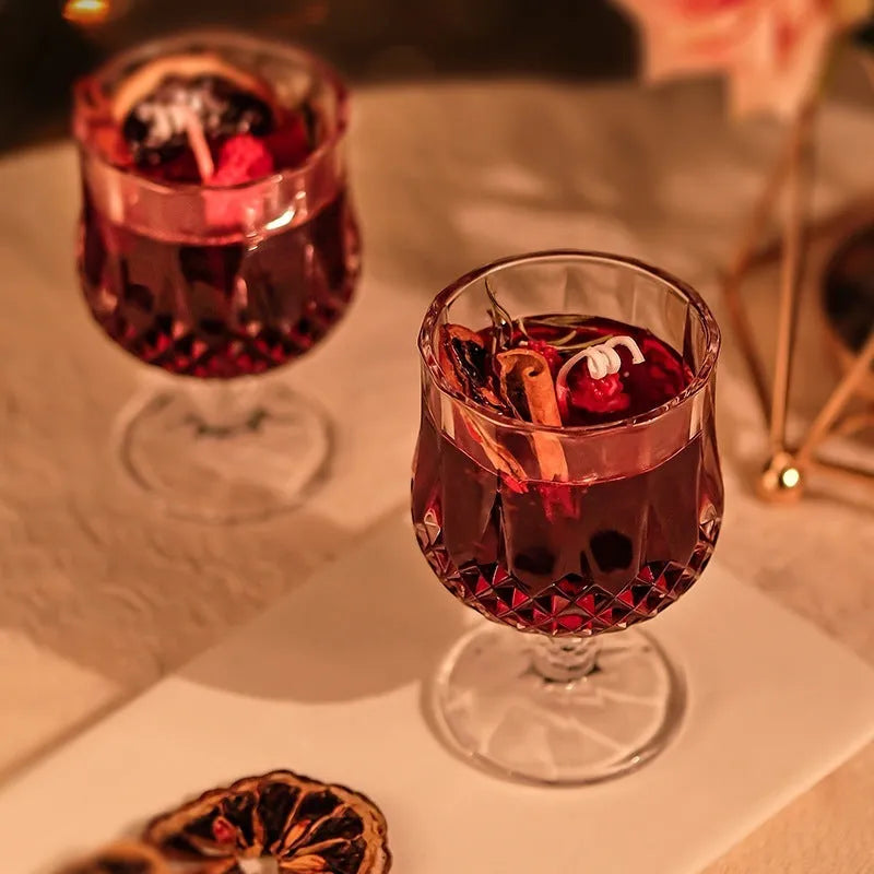 Glass wine goblet shaped aromatherapy candle with French mulled wine fragrance